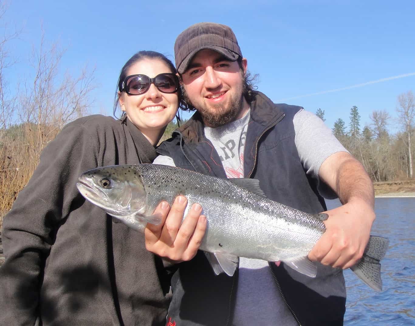 Jacqueline and Jeremy with a Rogue river steelhead caught on the middle Rogue with guide Charlie.