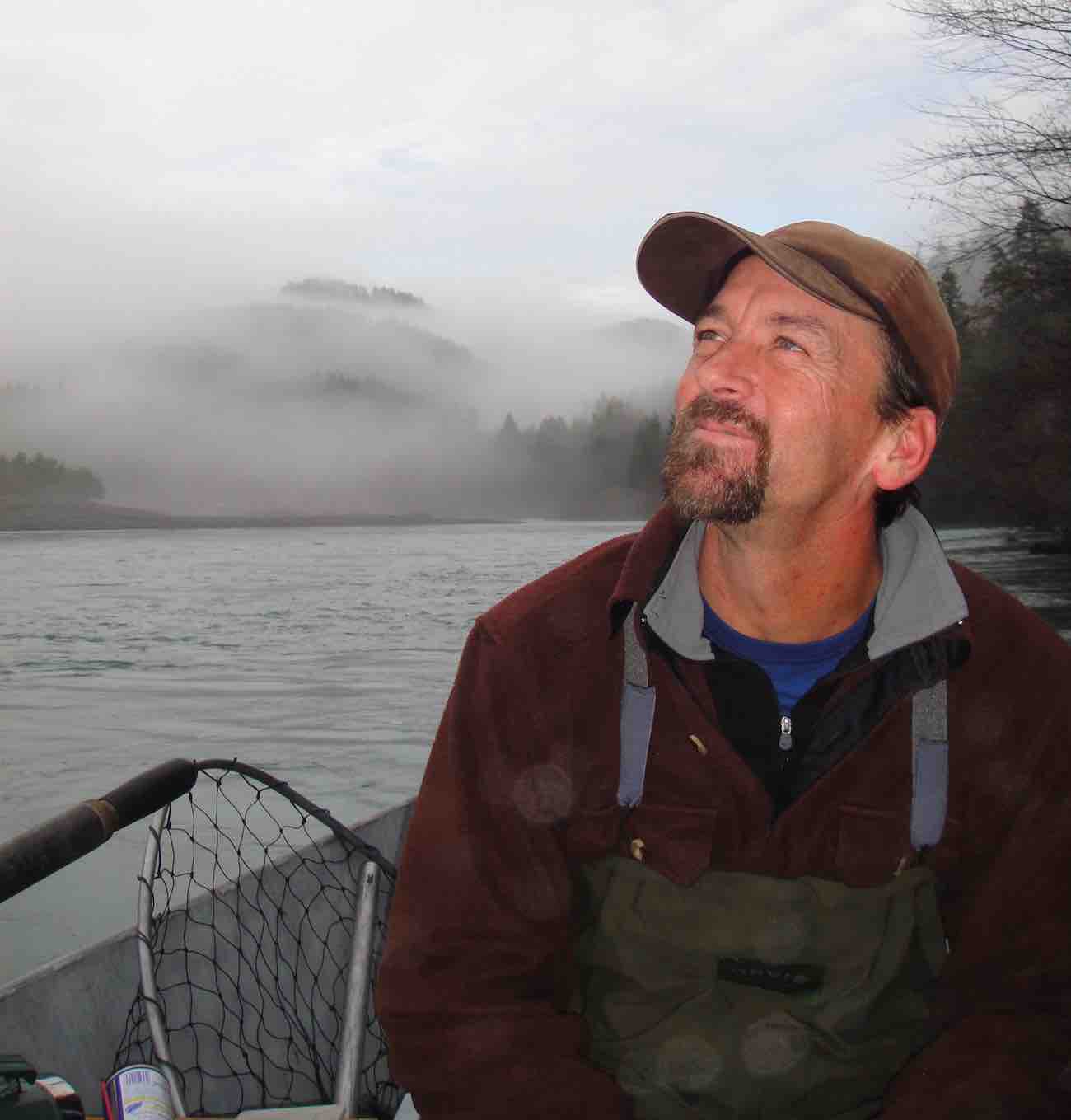 Rogue river fishing guide enjoying a morning on the Elk river from the comfort of his drift boat.