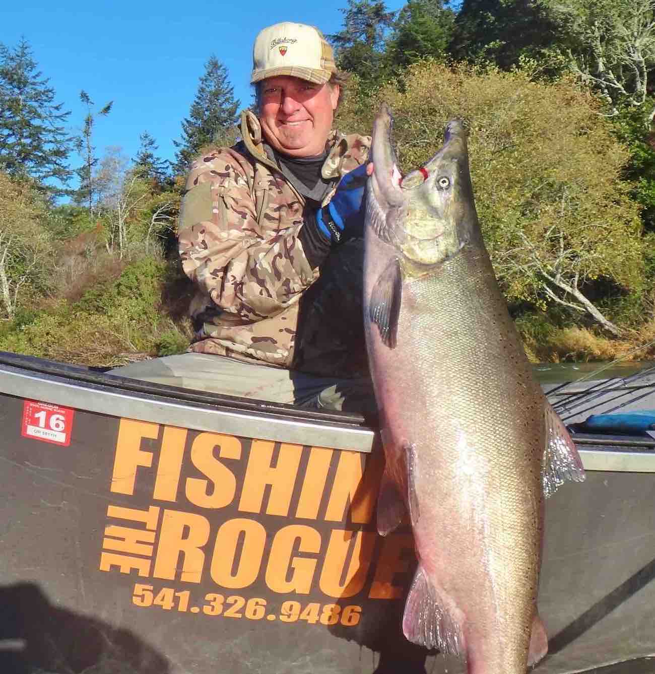 A 48 lb Chinook king salmon caught by Ed fishing the Elk river with fishing guide Charlie.
